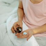 IMage of person pouring pills in hand