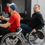 image of two men in wheel chairs