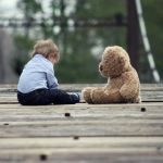 Child with Teddy Bear