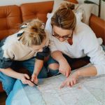 Two women looking at a map