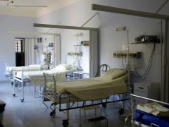 Image of hospital beds in an emergency room